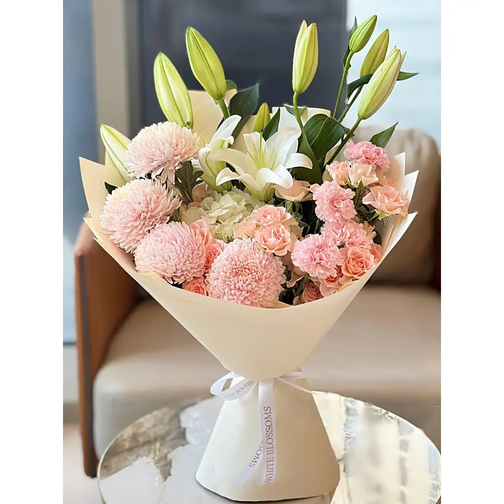 Dawn Petal Bouquet with white lilies, pink chrysanthemums, and peach carnations, White Blossoms flower boutique Dubai Abu Dhabi