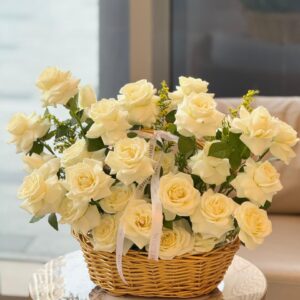 Ivory Rose Basket with white roses and golden solidago in a woven basket, White Blossoms flower boutique Dubai Abu Dhabi